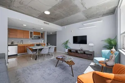 an open living room with a kitchen and a living room at 516-2Bd2Ba Midblock Apartment FREE parking in Miami