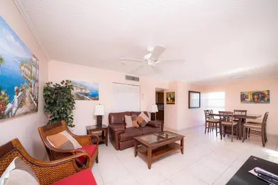 a living room with a couch and a table at Enjoy Fully Equipped 2BR Condo Near The Beach in Sunny Isles Beach
