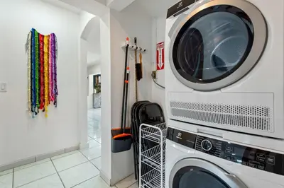a laundry room with a washer and dryer at The Wellness Retreat- Amazing Amenities Near Beach in Hollywood
