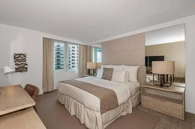 a large bedroom with a large bed and a desk at 1 Hotel King Suite 1BR 1 5BA in Miami Beach