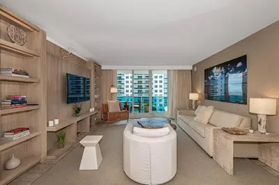 a living room with a couch and a table at 1 Hotel King Suite 1BR 1 5BA in Miami Beach