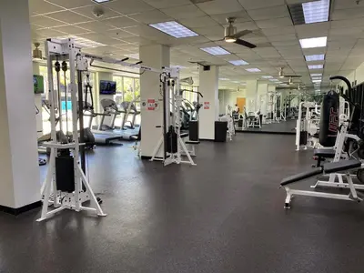 a gym with lots of treadmills and machines at Stunning apt! Oceanview! Parking included in Sunny Isles Beach