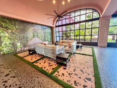 a living room with couches and a large window at AK414- Miami Beach Apt at Oceanfront Resort in Miami Beach