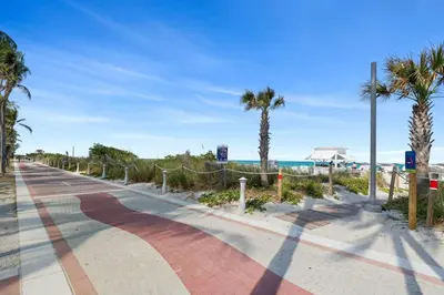 a street with palm trees and the beach at FontaineBleau Resort, with Balcony 10 min from SoBe in Miami Beach