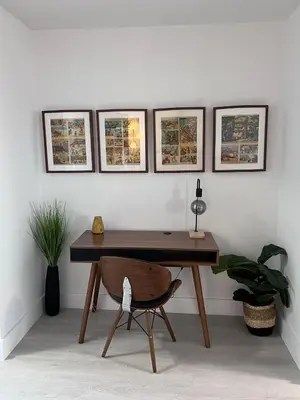 a desk with a chair and three pictures on the wall at Unique Water Views, free Parking 1bed 1 bath Rooffornomads 416 in Miami Beach