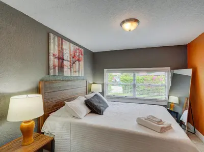 a bedroom with a bed with two towels on it at Luxury Miami Casa Bonita with Tropical Pool Oasis in Miami