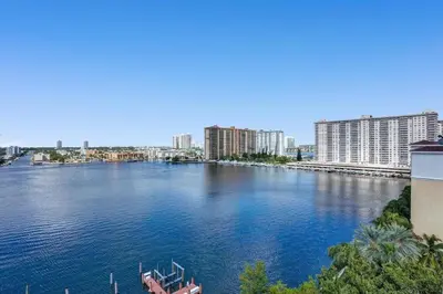 a view of a river in a city with buildings at Le Petit Italie ,water View 22 With Pool in Sunny Isles Beach