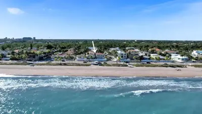 an aerial view of a beach with houses and condos at Winter Rate Discount Beachside Home Pool Views Beach Haven by AvantStay in Fort Lauderdale