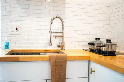 a kitchen counter with a sink and a sink at Cozy Tiny Home - Hidden Gem! in Miami