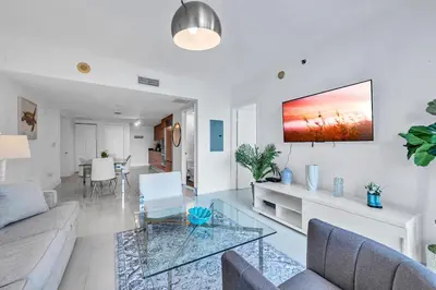 a living room with a couch and a table at Unique 1BR Icon Brickell WaterViews-Freespa in Miami