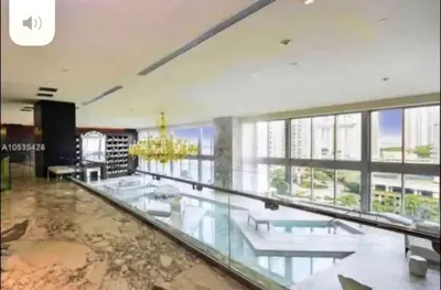 a glass floor in a building with a chandelier at Unique 1BR Icon Brickell WaterViews-Freespa in Miami
