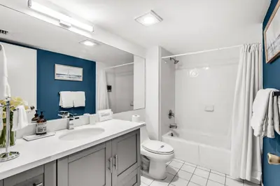 a bathroom with a sink and a toilet and a tub at Tropical Retreat with Beach Resort Amenities in Miami