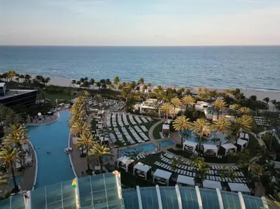 an aerial view of a resort near the ocean at FontaineBleau, Balcony w Ocean plus Bay and City View in Miami Beach