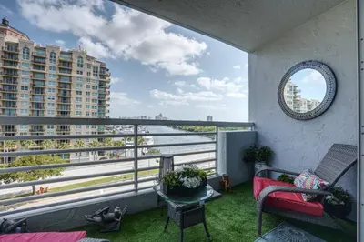 a balcony with a view of the water at GalleryOne Doubletree Hilton GC Secret Blending in Fort Lauderdale