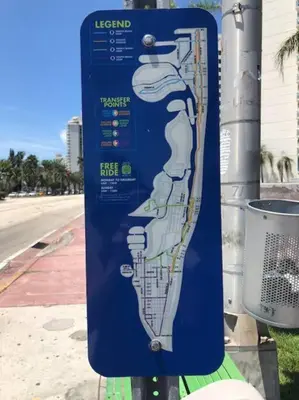 a blue sign on the side of a street at Ocean front 2 Bedroom and 2 Bathroom apartment at The Alexander Resort in Miami Beach