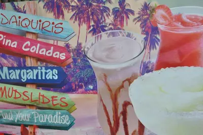 a picture of a sign with a margarita and a drink at Beach Front Resort - 2 Bedroom, 2 bathrooms, Sleeps 6, 2 Pools- at The Alexander in Miami Beach