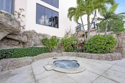 a bath tub in a garden in front of a building at Luxury Penthouse 3BR 3BA Oceanfront PH7 in Miami Beach