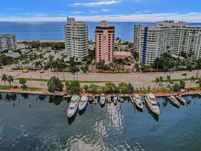 a group of boats docked in a harbor in a city at Luxury Penthouse 3BR 3BA Oceanfront PH7 in Miami Beach