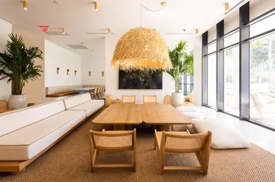 a living room with a couch and a table at Flow Hotel Miami in Miami