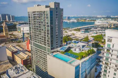 an aerial view of a tall building with a pool at The Bayfront II in Miami
