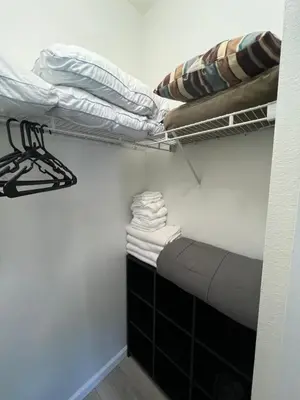 a room with two bunk beds and a pile of towels at Chic Private Retreat in Homestead