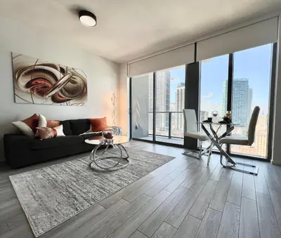 a living room with a couch and a table at Apartment in Miami downtown in Miami