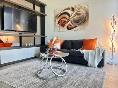a living room with a couch and a tv at Apartment in Miami downtown in Miami