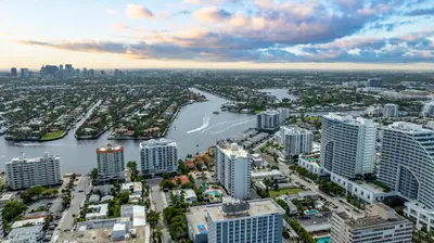 an aerial view of a city with a river and buildings at 2BR Fort Lauderdale W Residence with Double Living Room, Ocean & Intercoastal Views, Brand New Sofas! in Fort Lauderdale