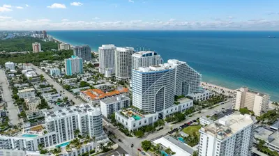an aerial view of a city and the ocean at 2BR Fort Lauderdale W Residence with Double Living Room, Ocean & Intercoastal Views, Brand New Sofas! in Fort Lauderdale