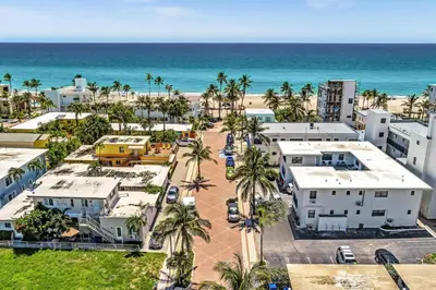 an aerial view of a resort with the beach at Beachfront & Pool Access Unit W 2 Queen Beds in Hollywood