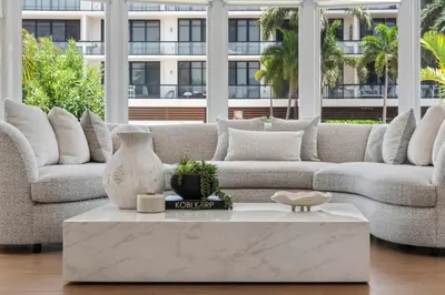 a living room with a couch and a coffee table at Villa Seminole in Fort Lauderdale