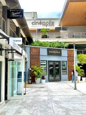 a street sign in front of a building at GroveO4 10 min from the Beach in Miami