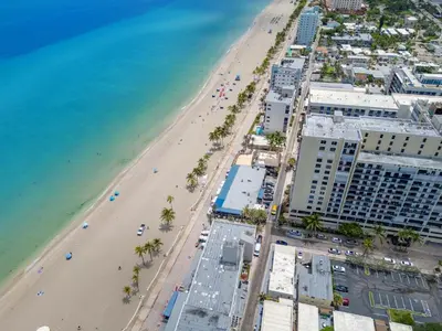 an aerial view of a beach and buildings at ULTRA exciting apartment at the Boardwalk in Hollywood