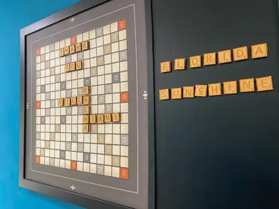 a board game on a television with the words monopoly at Villa Palma - Prime Location, Pool, Game Room, Outdoor Kitchen in Miami