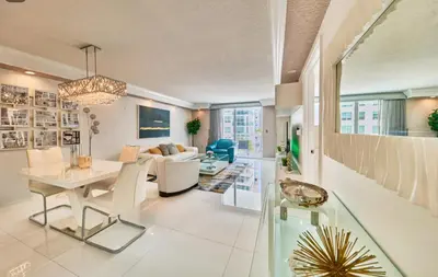 a living room with a table and a couch at Serene View 1 BR in Miami