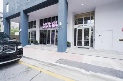 a car parked in front of a store at NEW Luxury Downtown Apartment - Gym Pool Workspace in Miami