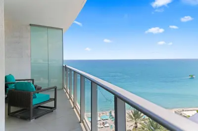a balcony with a view of the ocean at Oceanfront Luxury Condo With WaterView in Hollywood