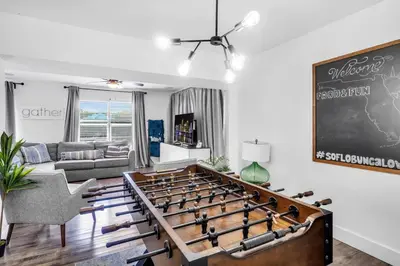 a living room with a large billiard sidx sidx sidx sidx sidx at Spacious 5 Bedroom Heated Pool and Hot Tub, 12 minutes to the Beach in Hollywood