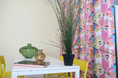 a table with a potted plant on top of it at B05 Nicest 1 bedroom APT in Midtown Miami in Miami