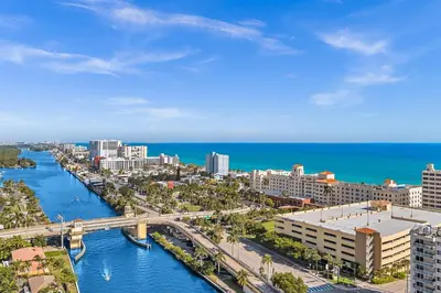 an aerial view of a city with a bridge and the ocean at Downtown Hollywood Beach Blvd Studio Getaway in Hollywood