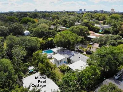 an aerial view of the main pool cottage in the trees at Miami Pool Cottage, tropical garden paradise in Miami