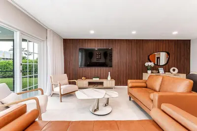 a living room with a couch and a tv at Waterfront Pool & Amazing Location - WOW in Miami