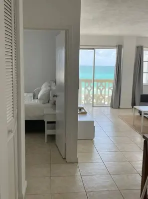 a bedroom with a bed and a view of the ocean at 1401- Stylish 1BR& 2BA with Breathtaking Ocean Views in Miami Beach