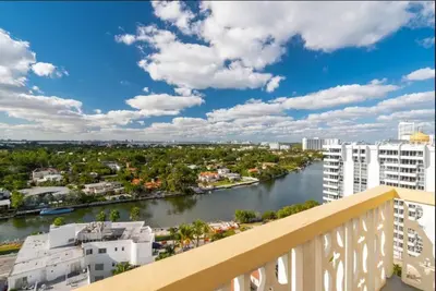 a view of a river from the balcony of a building at 1405- South Beach 1BR & 1BA- Stunning Ocean View Oasis in Miami Beach