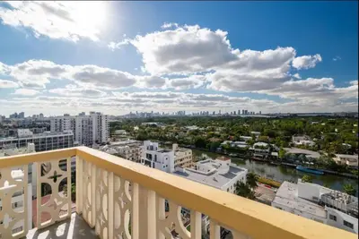 a view of the city from a balcony of a building at 1405- South Beach 1BR & 1BA- Stunning Ocean View Oasis in Miami Beach