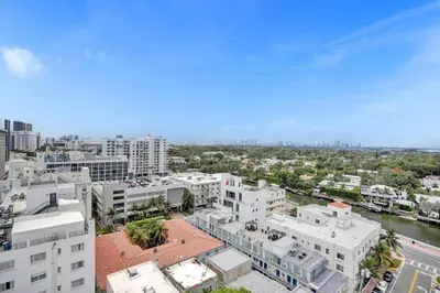 an aerial view of a city with buildings and a river at 1506- 1BR & 1BA Retreat with Stunning Intracoastal Views in Miami Beach