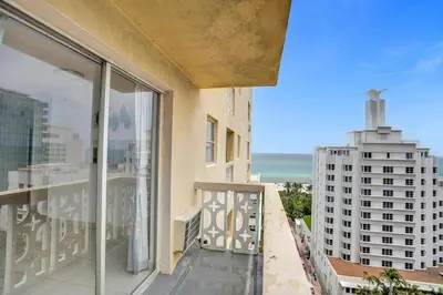 a balcony of a building with a view of the ocean at 1506- 1BR & 1BA Retreat with Stunning Intracoastal Views in Miami Beach