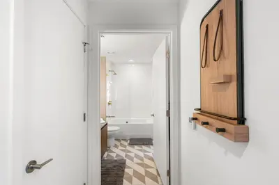 a bathroom with a toilet and a bath tub at 5108Great Penthouse, Bay view, in the heart of MIAMI in Miami