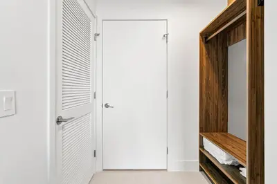 a hallway with a closet and a door at 5108Great Penthouse, Bay view, in the heart of MIAMI in Miami