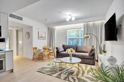 a living room with a couch and a table at Vonder Miami Beach - Unit 1 in Miami Beach